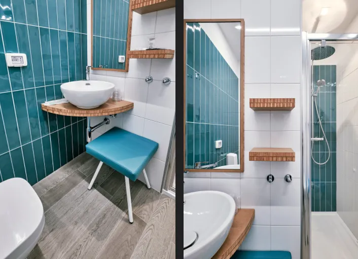Bagno moderno con lavabo e doccia rivestiti in piastrelle verde smeraldo.